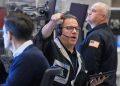 Stock market sinks as AI and interest rate worries grip investors