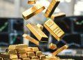 Gold lowers on easing tensions, but rate cut bets, China demand provide floor