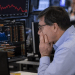 UK equities hover at three-week lows as investors assess global risks